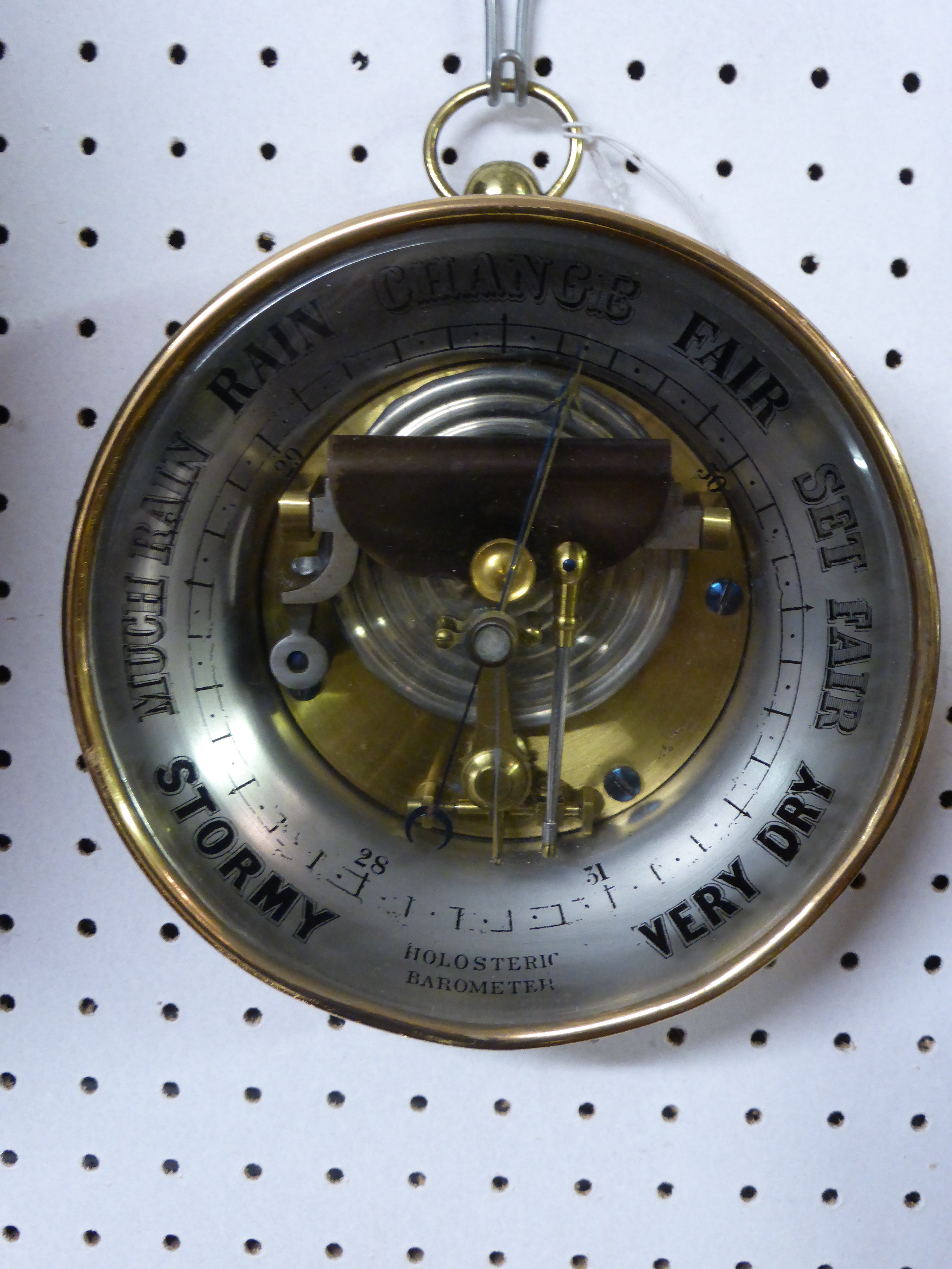 Holosteric or aneroid barometer in brass casing, diameter 16.5cm, 20th century