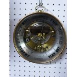 Holosteric or aneroid barometer in brass casing, diameter 16.5cm, 20th century