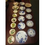 Seven French pottery plates glazed with olive and lemon branches etc, with painted cockerel marks to