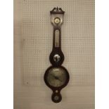 A 19th century banjo barometer in mahogany casing with boxwood stringing, scrolled pediment and