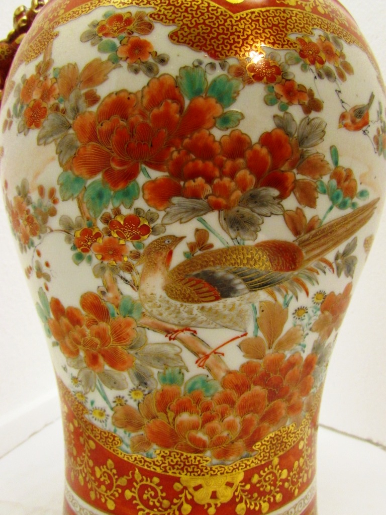 A Japanese porcelain baluster vase moulded with two dogs at the shoulder, red ground and gilding, - Image 3 of 7