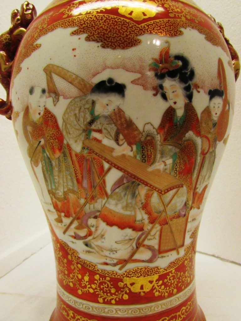 A Japanese porcelain baluster vase moulded with two dogs at the shoulder, red ground and gilding, - Image 4 of 7