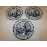 Three delft style European tin glazed plates painted in blue and white in the Chinese style with man