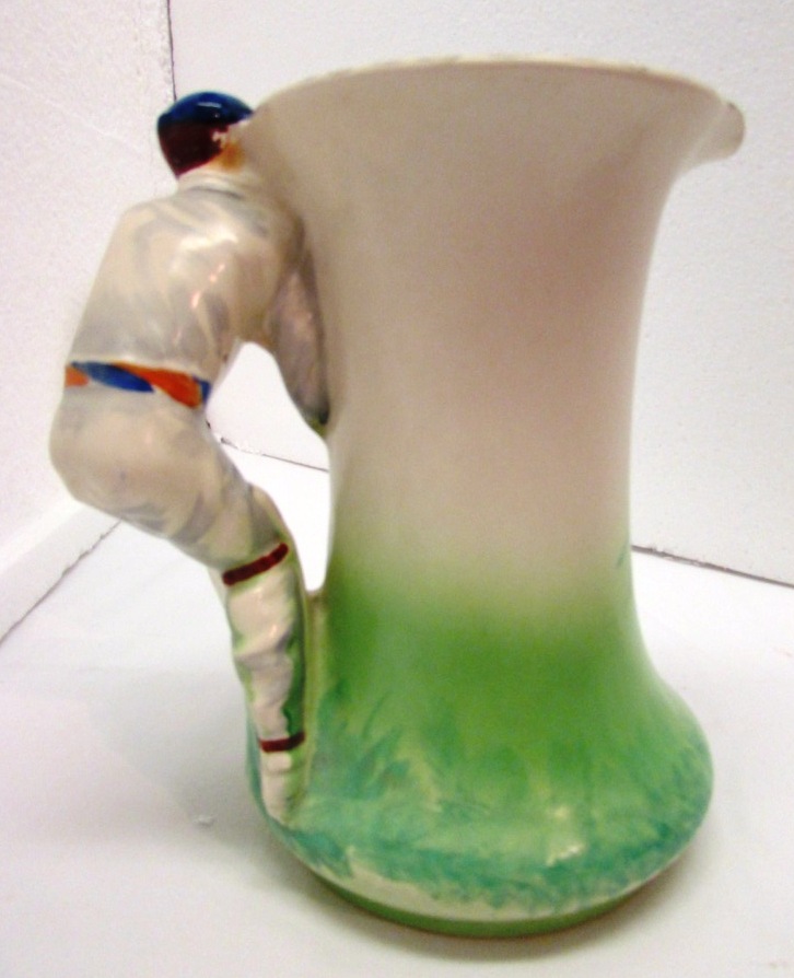 Burleigh Ware pottery cricket jug painted green and cream, the handle moulded as batsman, - Image 2 of 5