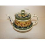 Transitional Macintyre teapot reg no. 401753 decorated with cream and green bands of floral and