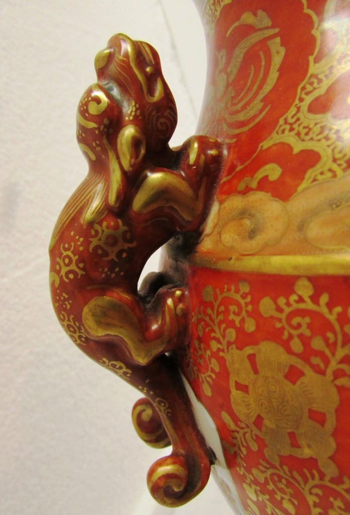 A Japanese porcelain baluster vase moulded with two dogs at the shoulder, red ground and gilding, - Image 5 of 7