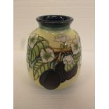 Moorcroft trial piece pottery vase of bell shape, pale yellow ground merging to blue at neck and