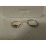 18ct white gold ring, 3.8g; and an 18ct gold diamond engagement ring with cross-over setting (one