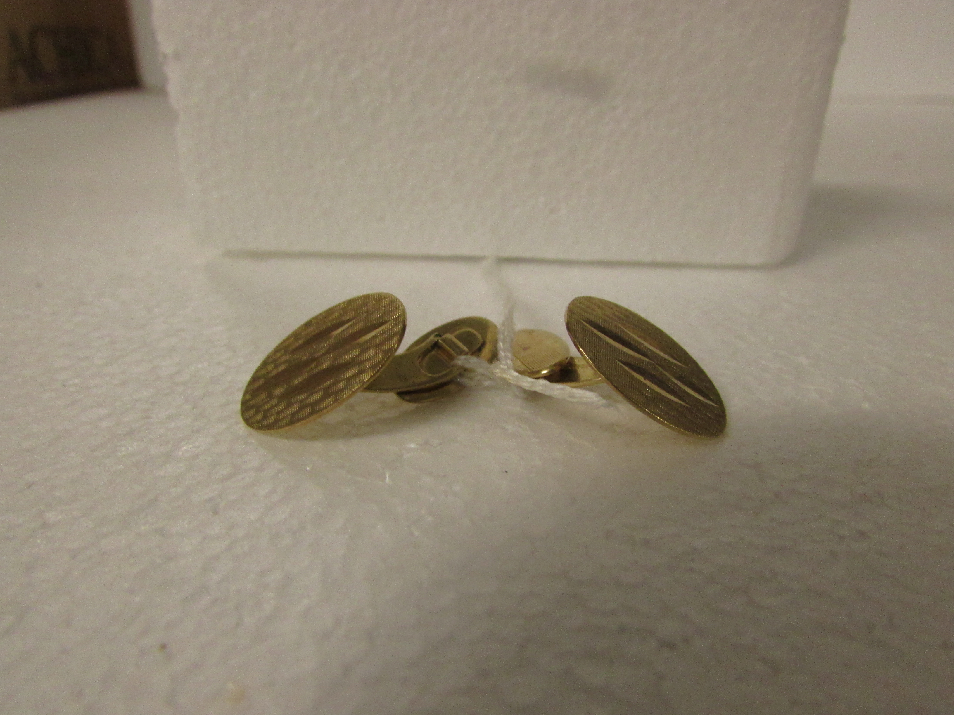 Pair of 9ct gold oval cufflinks, 5.8g