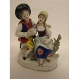 Porcelain figural group of man and woman with posy on oval base with foliage, the edge of the base