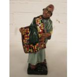 Royal Doulton figure 'Carpet Seller' HN1464 (damaged) height 22cm