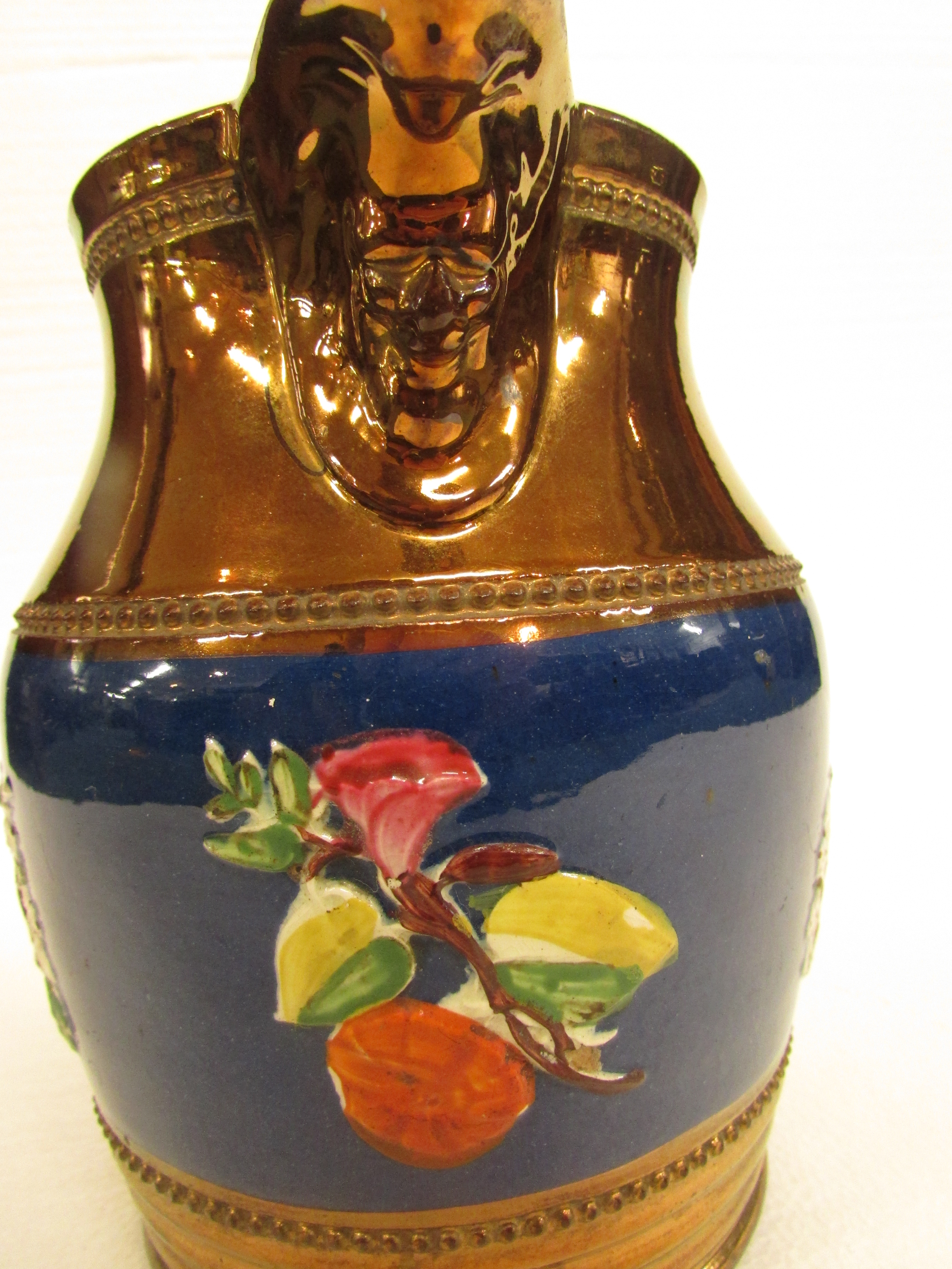 A 19th century copper lustre jug with a band of blue glaze with seated girl and dog in relief - Image 3 of 4