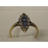 Sapphire and diamond ring on thin gold shank (three sapphires and twelve small diamonds)
