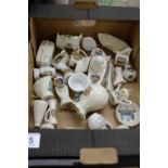 A collection of various crested china mi