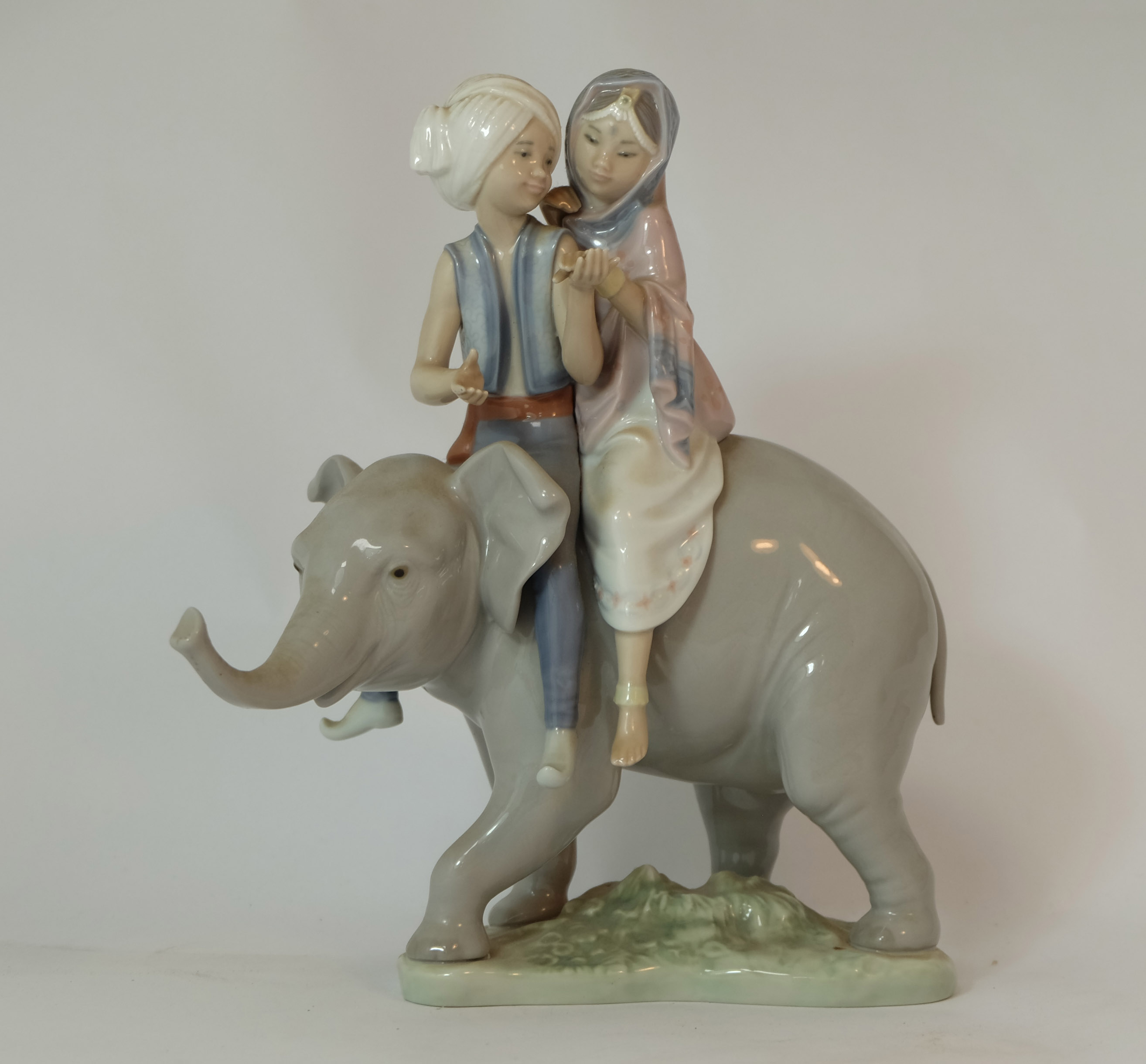 Lladro figure Boy & Girl on Elephant, height 24cm ( Broken leg to young girl. - Image 2 of 2