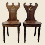 A exceptional quality pair of Georgian parlour chairs, with doves carrying olive branch motifs to
