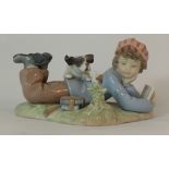 Lladro figure Boy seated with puppies