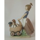 Lladro figure Girl pushing pram full of puppies, height 22cm