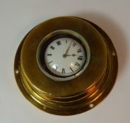 early Brass display case with pocket watch movement inside