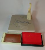 Rolex official items to include watchstand, Rolex book awards for enterprise 1996, boxed leather