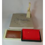 Rolex official items to include watchstand, Rolex book awards for enterprise 1996, boxed leather