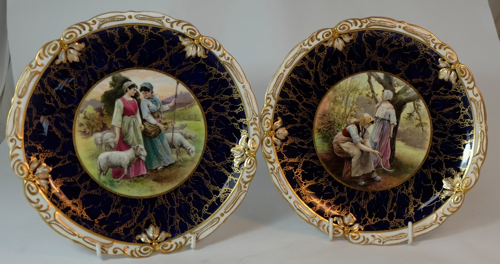 Pair Hammersley & Co gilded cabinets plates hand painted and transfer with Woman attending sheep