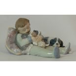 Lladro figure Boy lying with dog, length 18cm