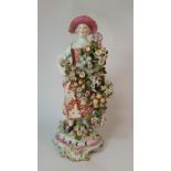 18th Century Chelsea Bow porcelain figure of Lady holding flowers, height 28cm  (some slight loss