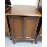 Panel sided record cabinet with two doors to front