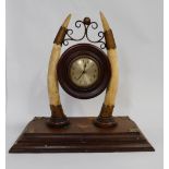 A late victorian mahogany & Brass and ivory mantle clock, pair tusks supporting round mahogany