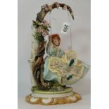 Capodimonte large figure of Lady in Swing under floral canopy,