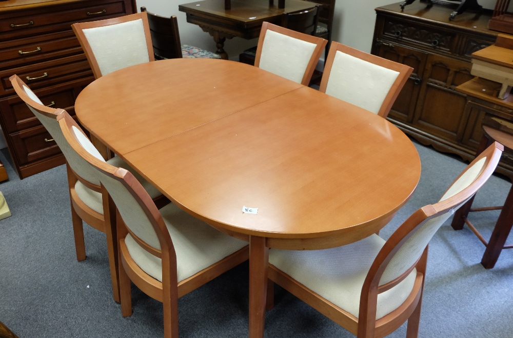 Modern dinning table and six matching chairs