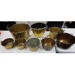 A collection of early Victorian jam pans in various sizes (8)