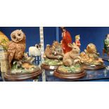 Royal Doulton resin figures of a group of beavers, a family of hedgehogs,