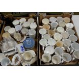 A collection of commemorative pottery including mugs plates,