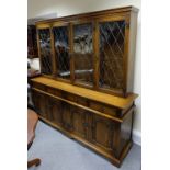 Large Oak Priory Bookcase  4 leaded glass doors with 4 draws and doors below  182 x 182 x 46cm