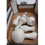 A collection of Belleek china to include shamrock vases,
