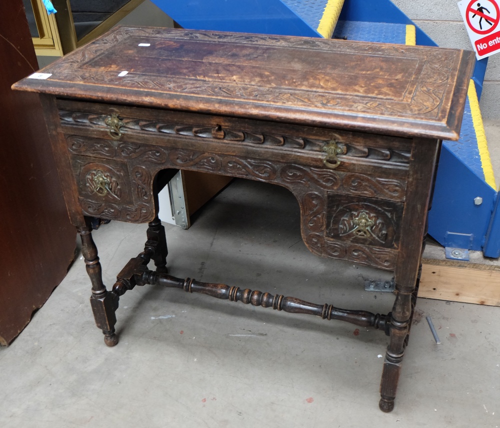 Victorian carved oak kneehole desk