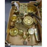 A collection of early brass ware including various Jam pans, set of weights from 4oz to 4lb,