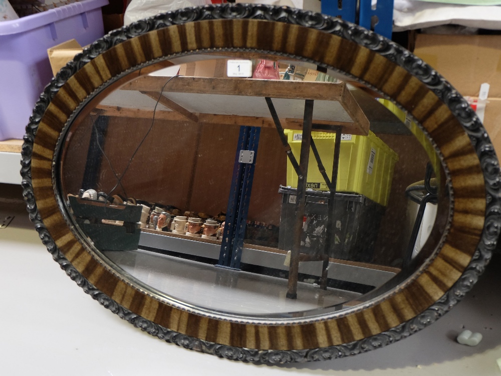 Edwardian Oval wall mirror in simulated carved frame