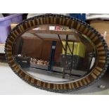 Edwardian Oval wall mirror in simulated carved frame