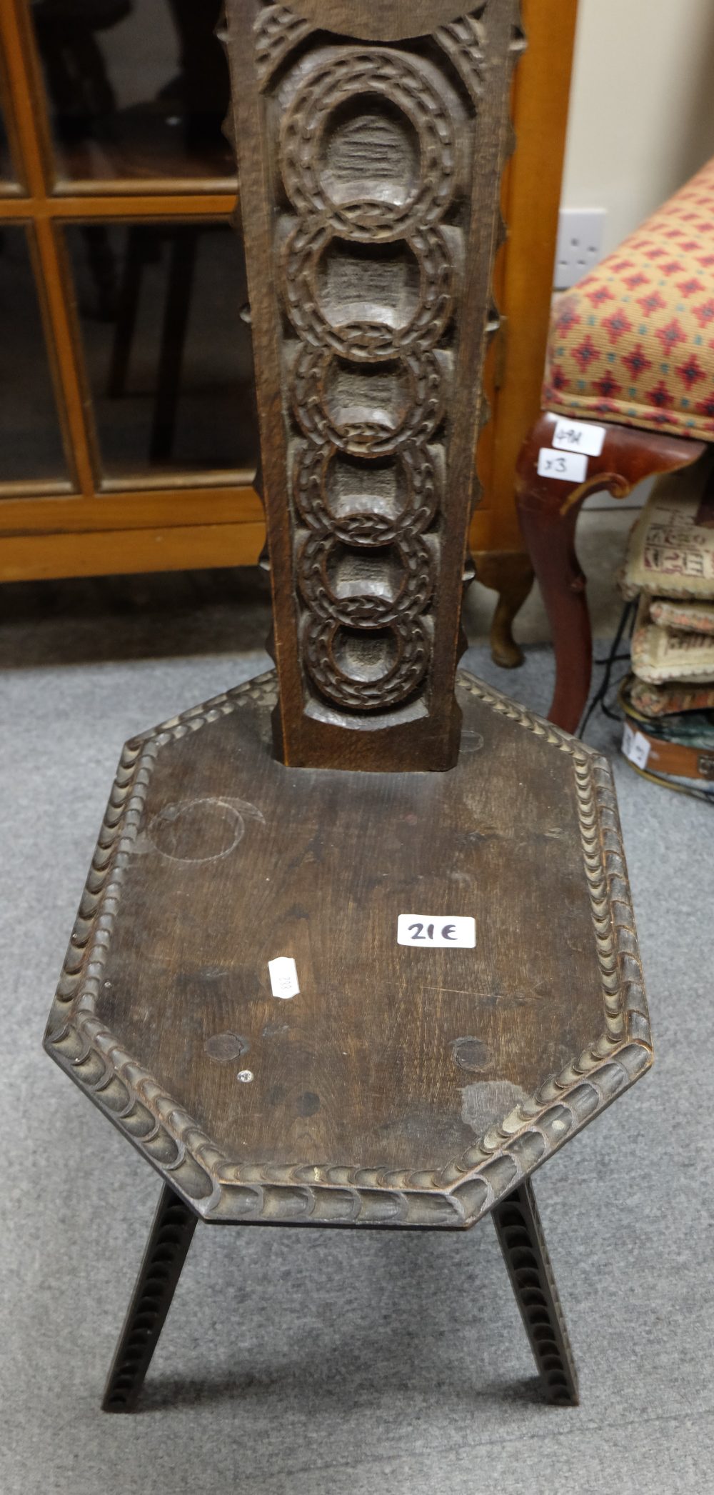 Carved high back peg stool