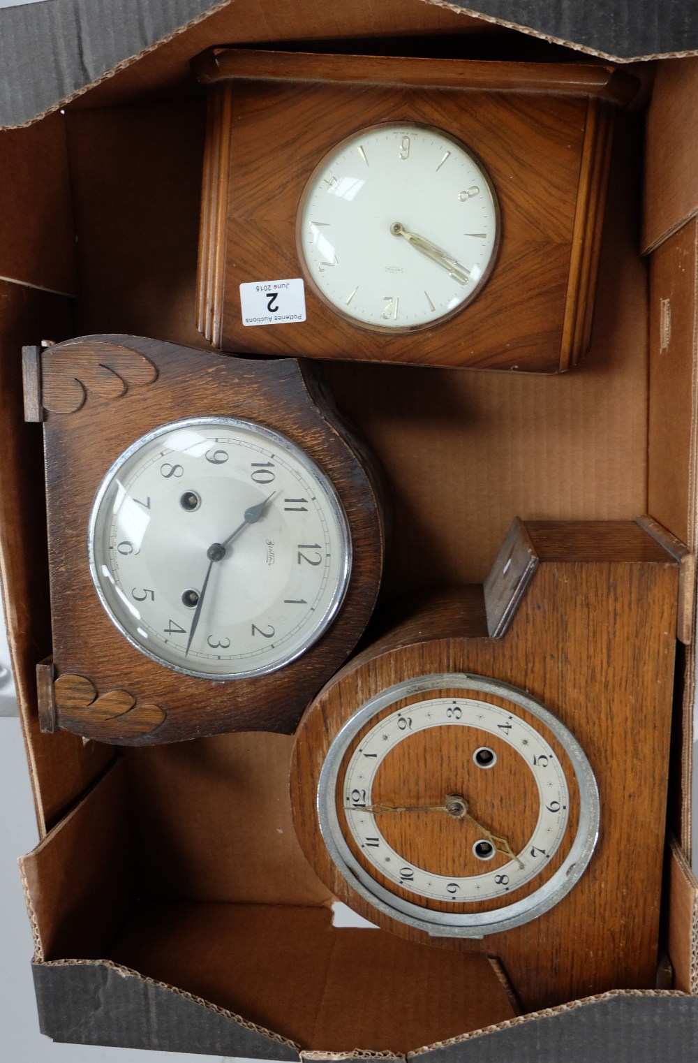 A collection of oak cased mantle clocks in various states of repair (3)