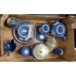 A collection of Wedgwood Royal Blue jasperware pieces including teapot, candy boxes, plates ,