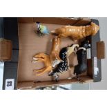 A collection of pottery animals including Labrador, collie, alsation,