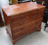Walnut veneered inlaid chest of drawers