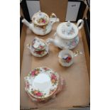 A collection of pottery items to include Royal Albert Old Country Rose teapot, side plates,