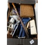 A collection of various items including boxed knife, fork and soon sets, old fashioned irons ,