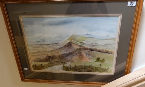 An unsigned framed watercolour of a landscape view showing Macclesfield