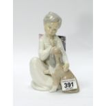 Lladro figure of boy with dog